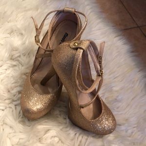 Gold high heels